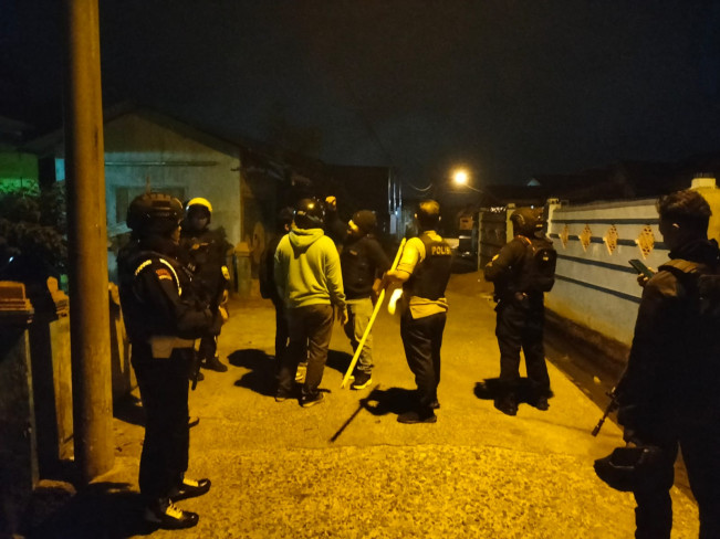 Sat Brimob melakukan penyisiran cegah gesekan antar warga di Belawan. [Dok Brimob Polda Sumut]
