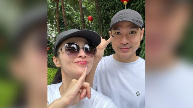Intip Foto-foto Kemesraan Sandra Dewi dan Suami