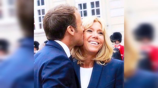 Presiden Prancis Emmanuel Macron mencium istri. [Instagram]