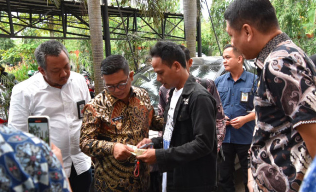 Hadiah Umrah Menanti Wajib Pajak yang Taat Membayar PKB