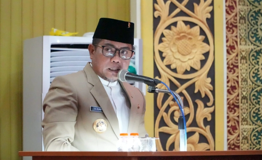 Bupati Pelalawan Zukri menghadiri Rapat Paripurna DPRD Kabupaten Pelalawan, Jumat (22/8/2025). [Dok. Pemkab Pelalawan]