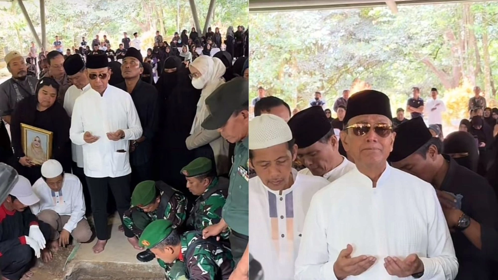 Wiranto bersama keluarga memanjatkan doa terakhir sebelum jenazah almarhumah dimakamkan. [TikTok/a@solokini]