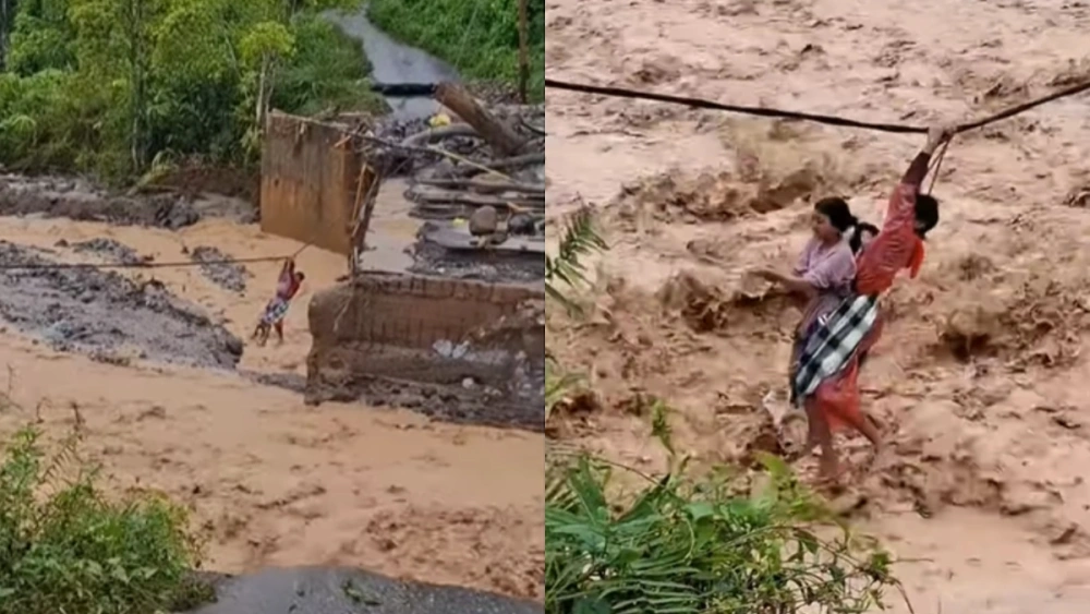 Viral! Akses Terputus, Warga di Tapsel Bergelantungan di Kabel Listrik Seberangi Sungai Deras