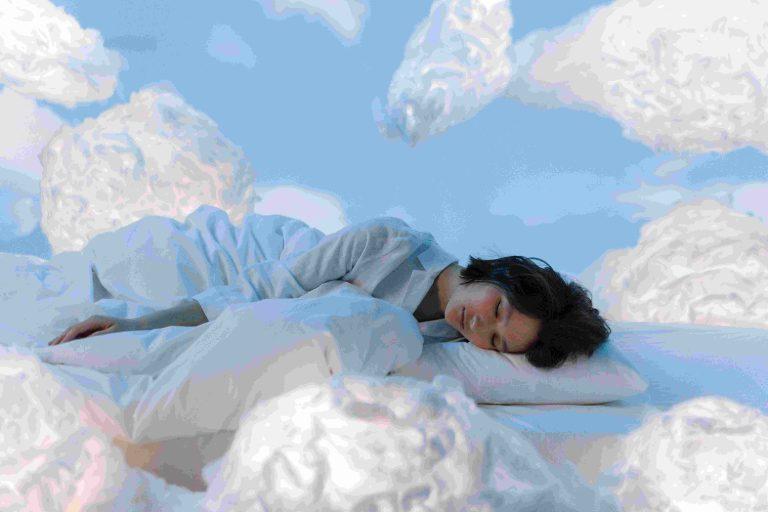 Photo by Ron Lach : https://www.pexels.com/photo/photo-of-a-woman-sleeping-near-fluffy-clouds-8264248/